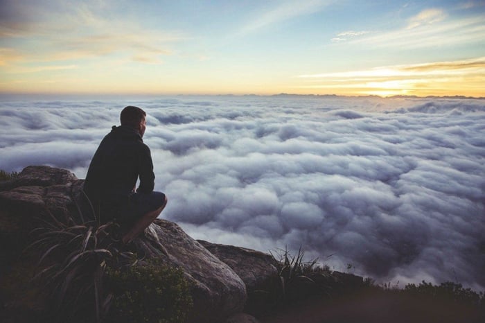 A man looking over clouds demonstrates B2B Networking