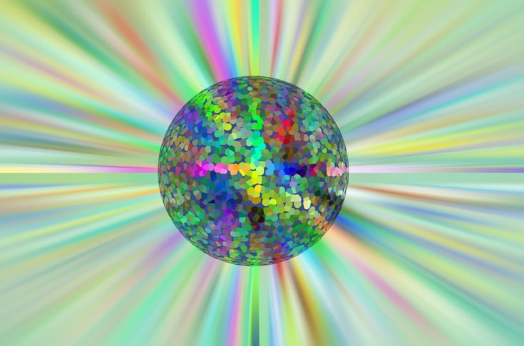 Multicolored pointillist planet in front of a starburst with radial blur, for astronomical and environmental themes of origin, radiance, transformation