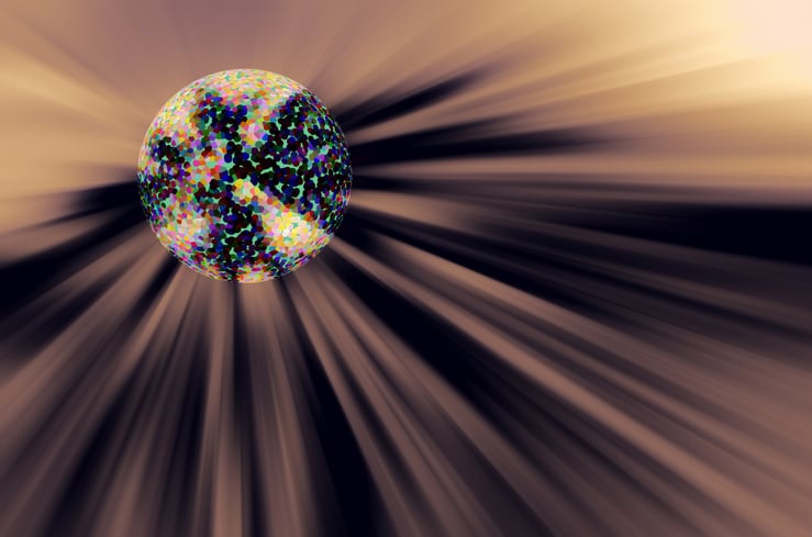 Multicolored pointillist world in formation -- or transformation -- near the source of a massive starburst with radial blur